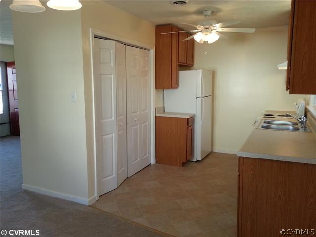 6591 Balsam Road Richmond, VA 23225 - Photo 8 of 24 a view of a storage & utility room with a sink