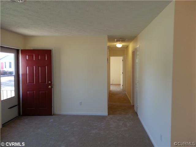 6591 Balsam Road Richmond, VA 23225 - Photo 10 of 24 a view of an empty room and window