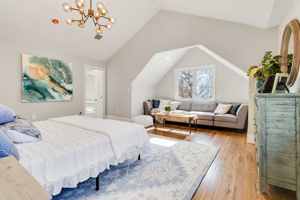 3 Cedar Street Newton, MA 02459 - Photo 16 of 33 a bedroom with a bed couch and a window