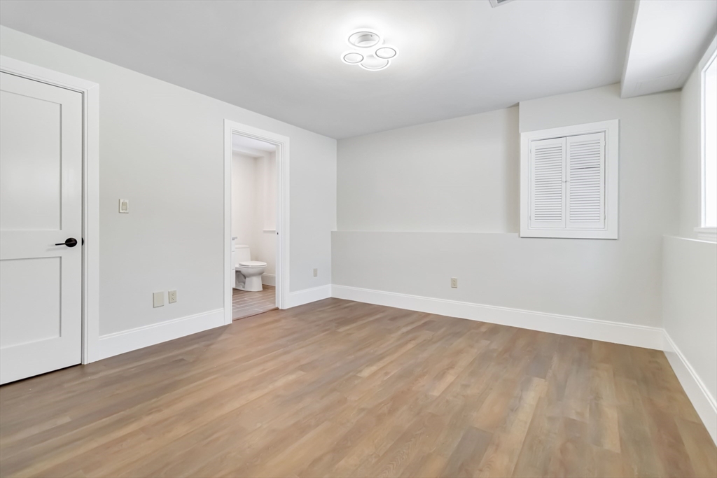 3 Cedar Street Newton, MA 02459 - Photo 24 of 33 wooden floor in an empty room