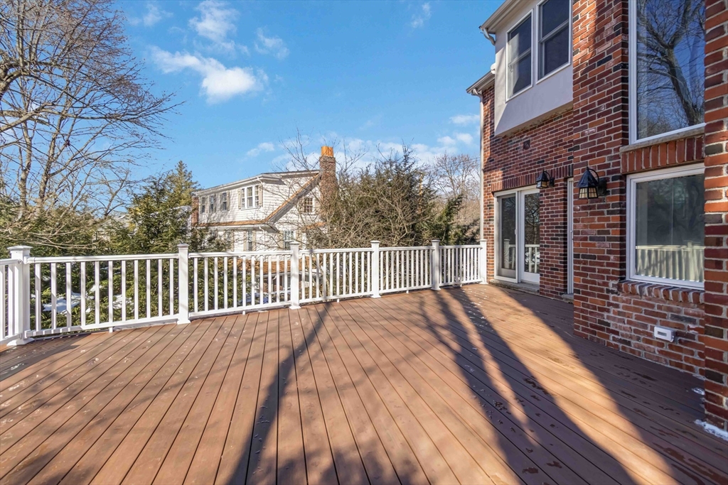 3 Cedar Street Newton, MA 02459 - Photo 29 of 33 a view of backyard with a deck and wooden floor