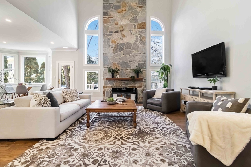 3 Cedar Street Newton, MA 02459 - Photo 3 of 33 a living room with furniture and a flat screen tv
