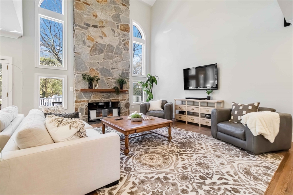 3 Cedar Street Newton, MA 02459 - Photo 4 of 33 a living room with furniture wooden floor and a flat screen tv