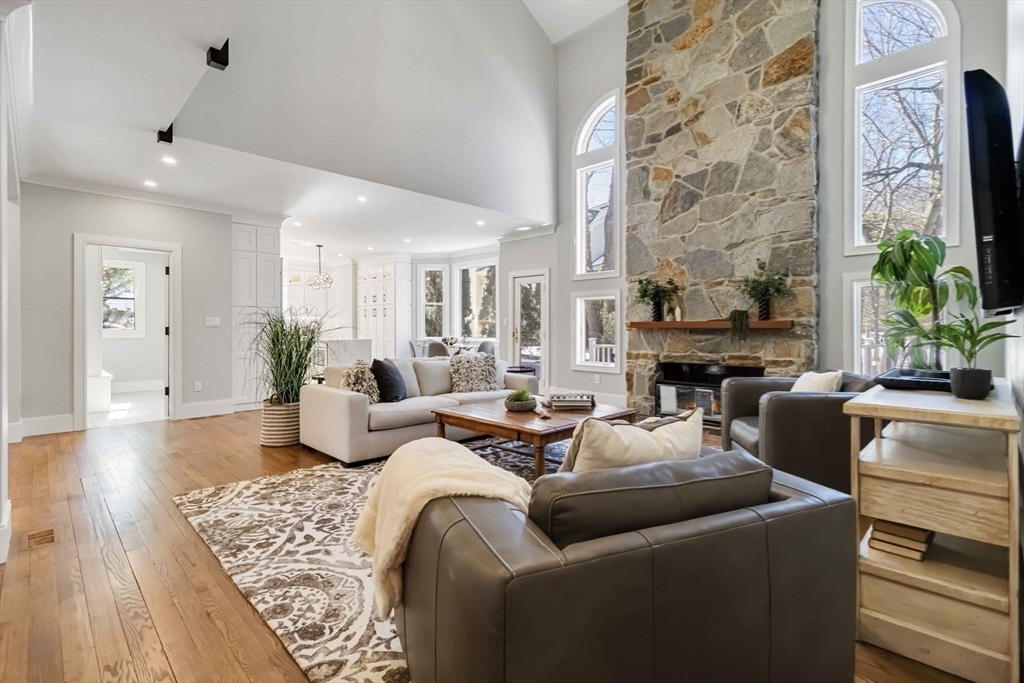 3 Cedar Street Newton, MA 02459 - Photo 7 of 33 a living room with furniture fireplace and wooden floor