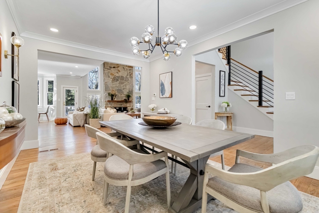 3 Cedar Street Newton, MA 02459 - Photo 10 of 33 a view of a dining room with furniture and a chandelier