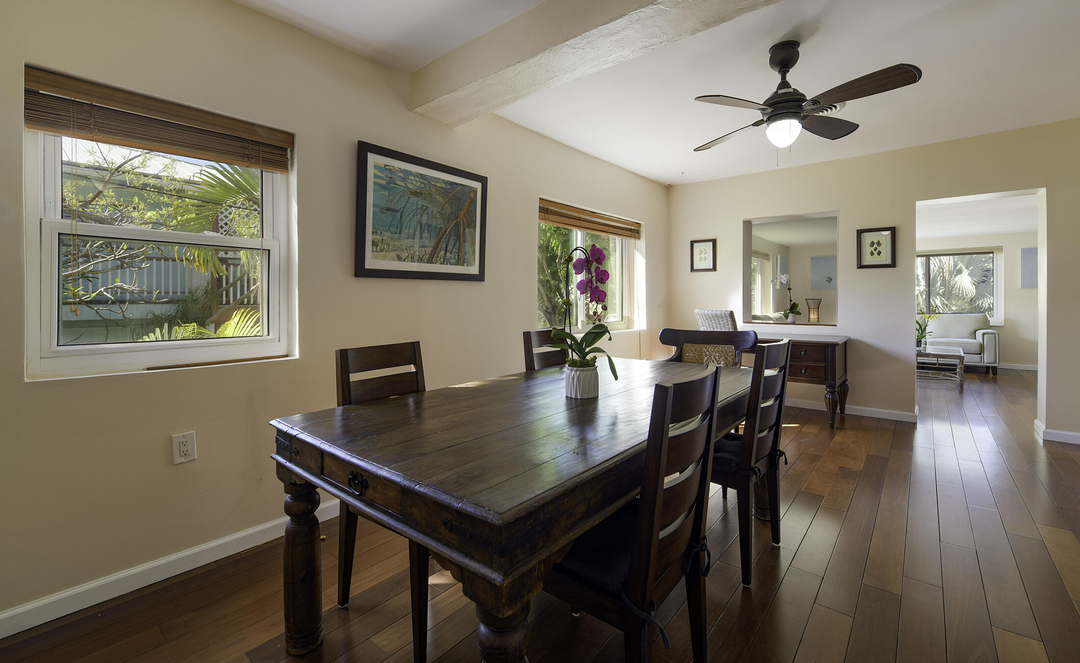 109 Beach Road Islamorada, FL 33036 - Photo 19 of 30 a view of a dining room with furniture window and wooden floor