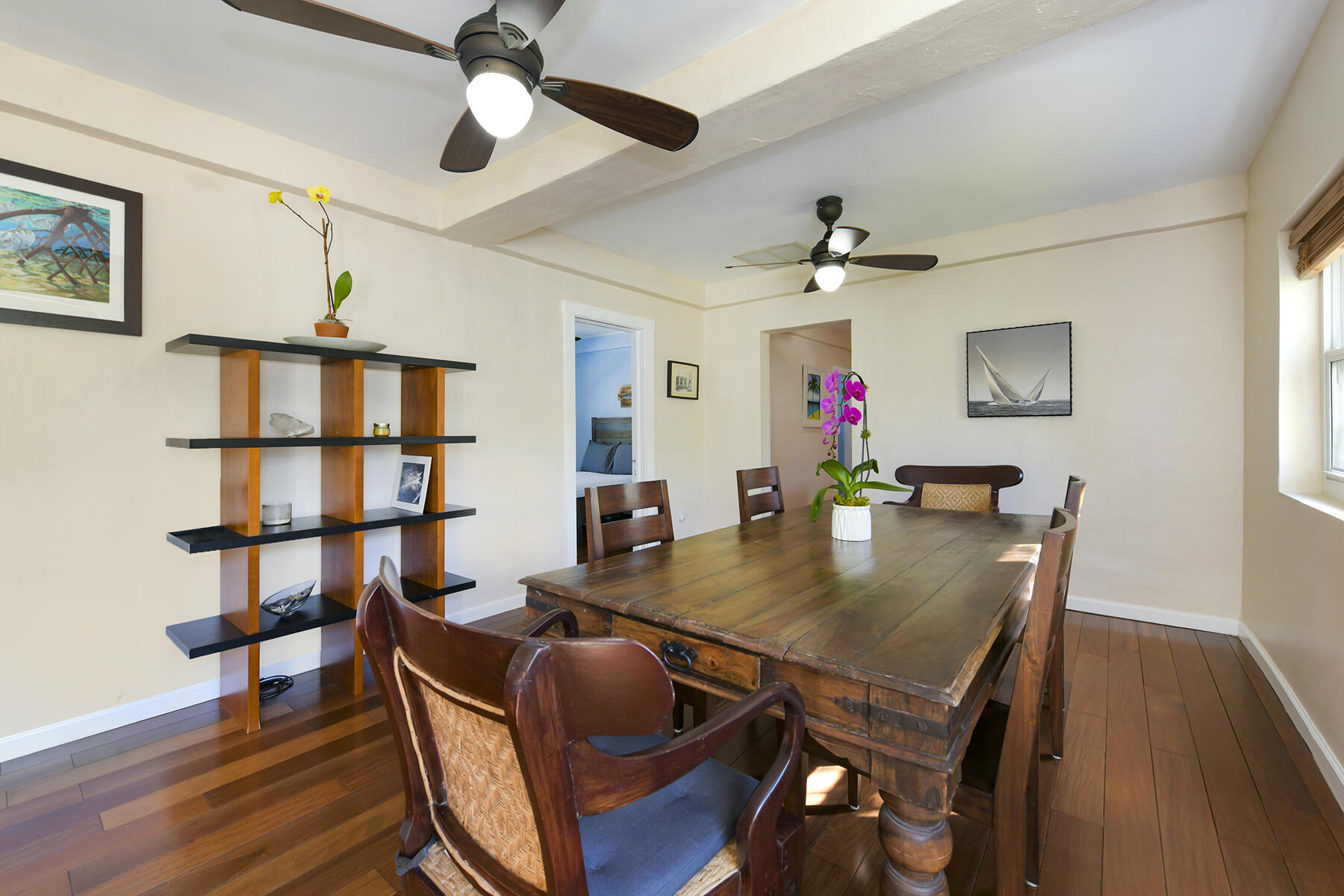 109 Beach Road Islamorada, FL 33036 - Photo 20 of 30 a view of a dining room with furniture wooden floor and chandelier
