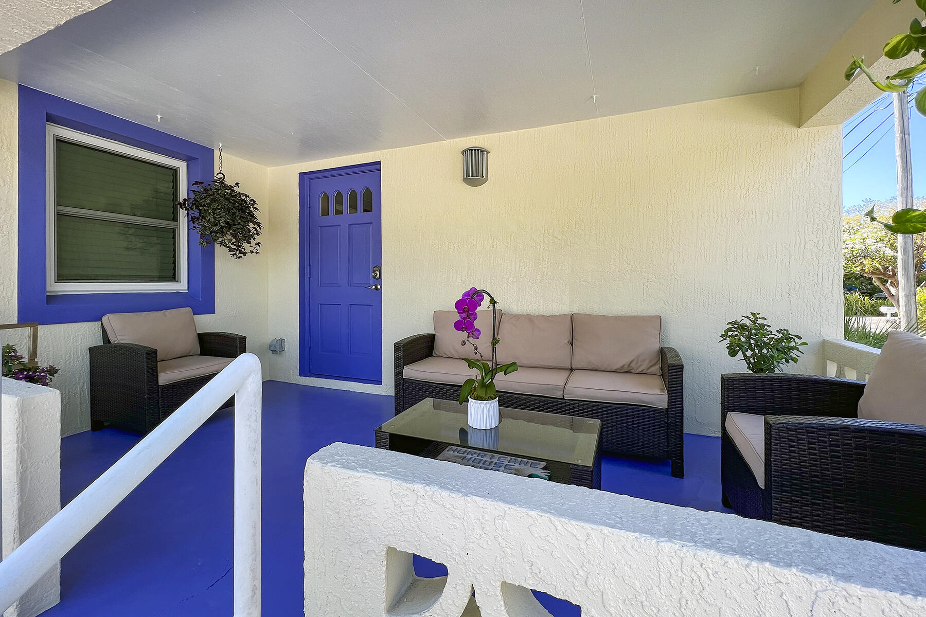109 Beach Road Islamorada, FL 33036 - Photo 5 of 30 a living room with furniture and a potted plant