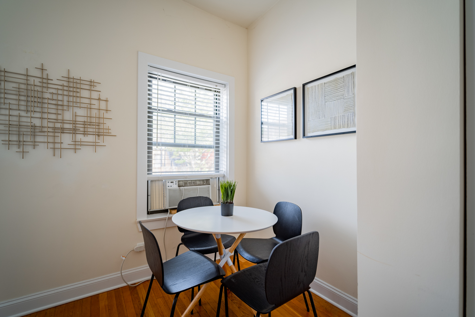 2989 North Lawndale Avenue, Unit 1 Chicago, IL 60618 - Photo 7 of 18 a view of a dining room with furniture and window