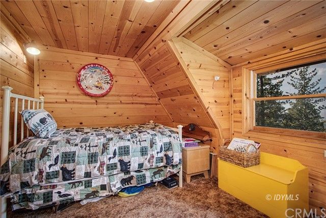25121 Pine Cove Road Idyllwild, CA 92549 - Photo 8 of 10 a view of a chairs with wooden walls