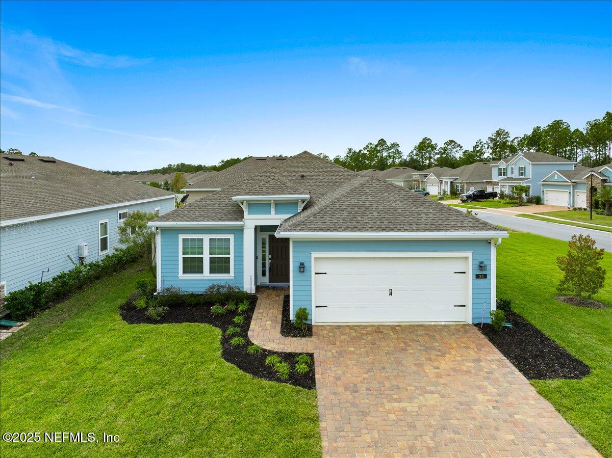 24 Purus Way St. Johns, FL 32259 - Photo 1 of 37 a view of a house with a yard