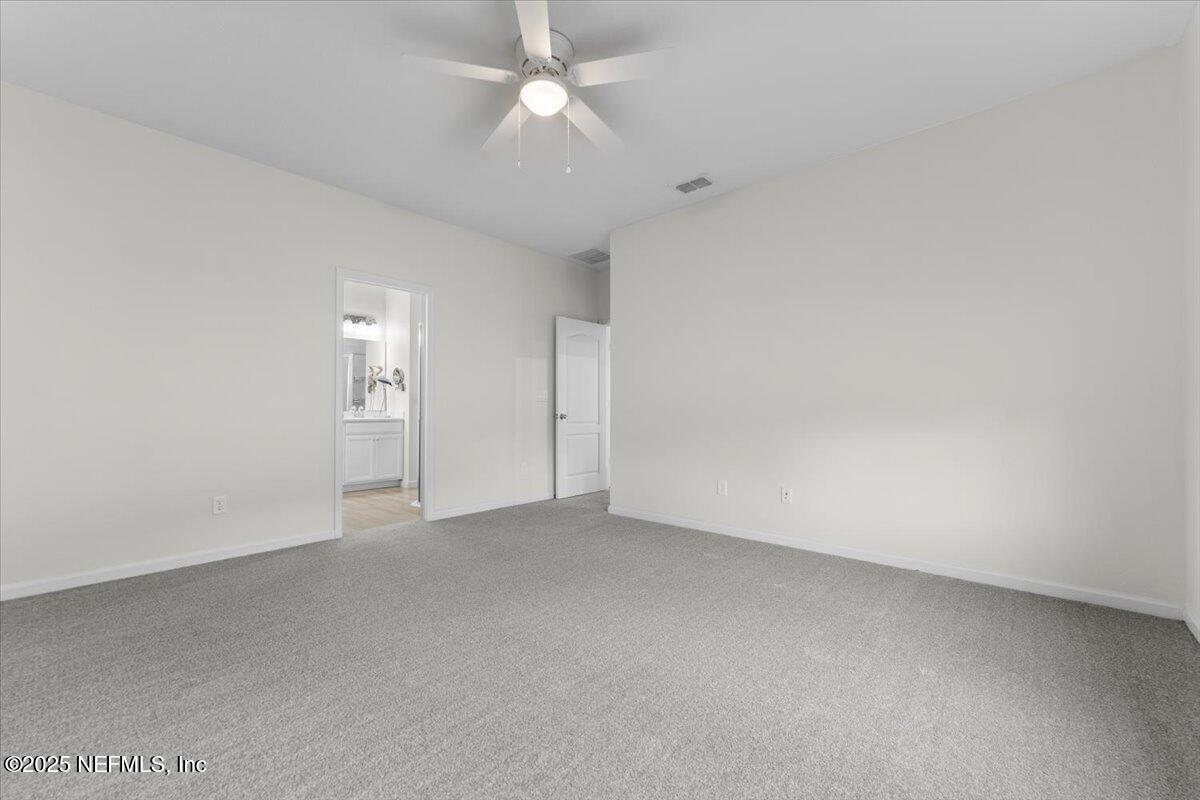 24 Purus Way St. Johns, FL 32259 - Photo 15 of 37 an empty room with a ceiling fan and a fan