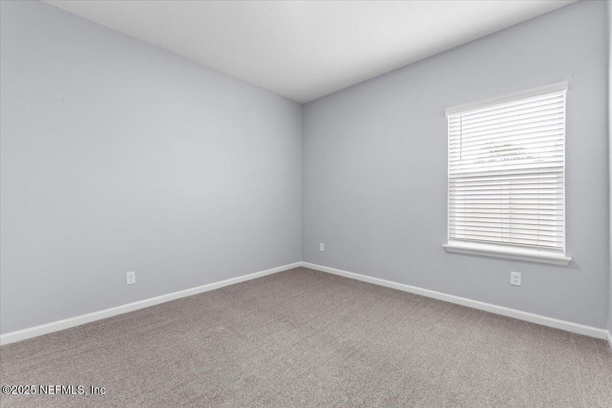 24 Purus Way St. Johns, FL 32259 - Photo 24 of 37 an empty room with a window