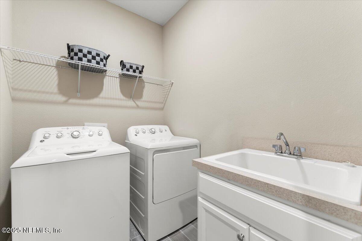 24 Purus Way St. Johns, FL 32259 - Photo 26 of 37 a utility room with dryer and washer