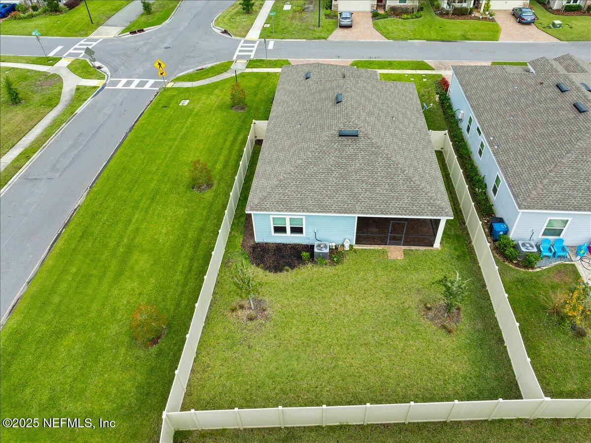 24 Purus Way St. Johns, FL 32259 - Photo 35 of 37 swimming pool view with a garden