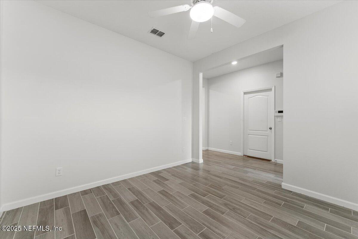 24 Purus Way St. Johns, FL 32259 - Photo 6 of 37 a view of an empty room with wooden floor