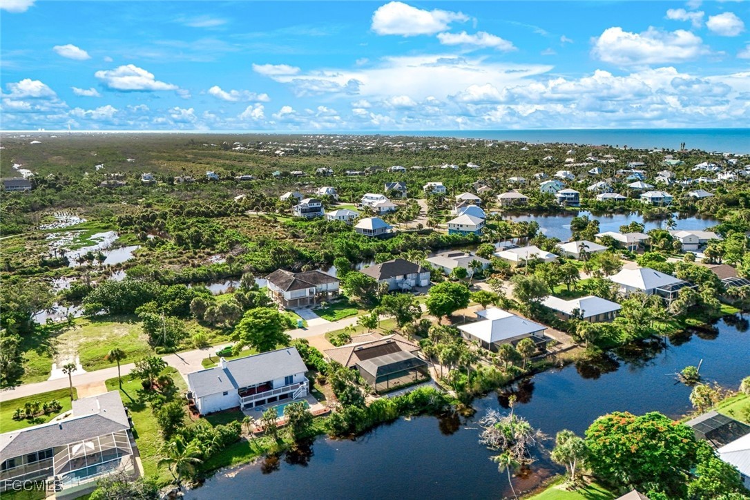 707 Durion Court Sanibel, FL 33957 - Photo 28 of 31 an aerial view of residential houses with outdoor space
