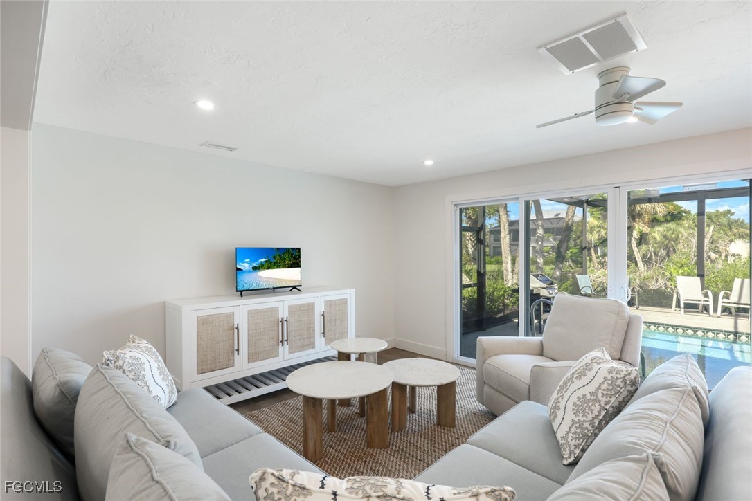 707 Durion Court Sanibel, FL 33957 - Photo 7 of 31 a living room with furniture and a window