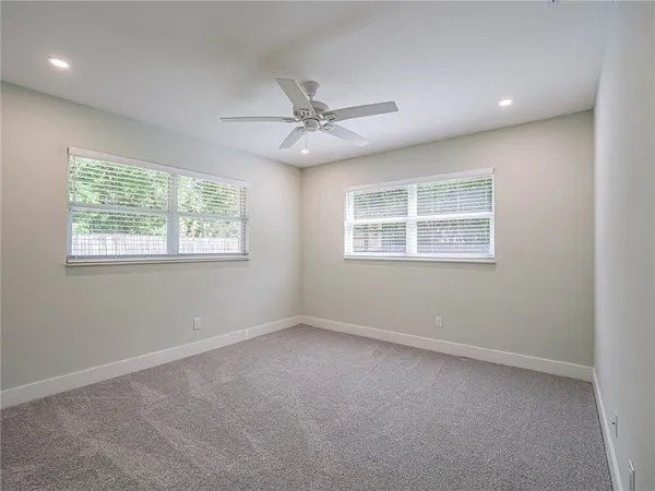 a view of an empty room with a window