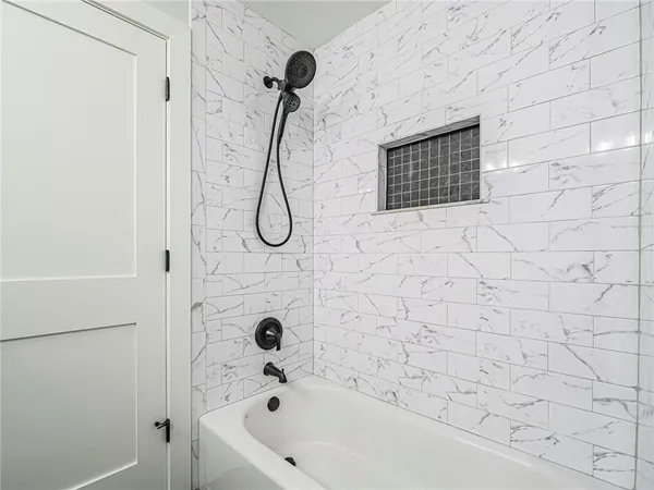 a bathroom with a bathtub