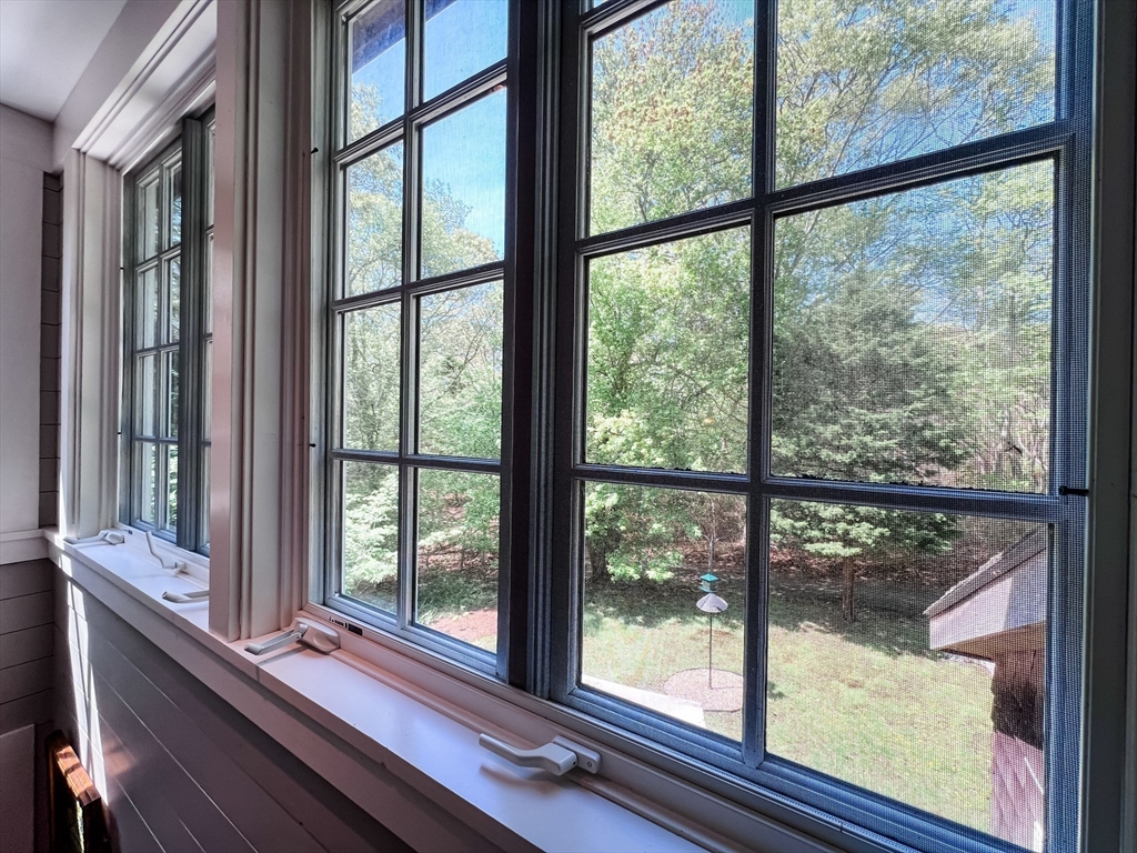 225 Lamberts Cove Road West Tisbury, MA 02568 - Photo 20 of 33 a view of room with wooden floor and furniture