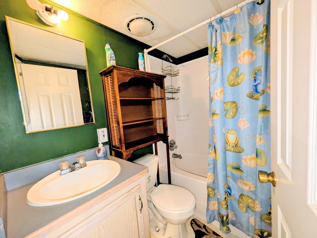 207 Seneca Hills Road Tionesta, PA 16353 - Photo 9 of 16 a bathroom with a sink toilet and shower