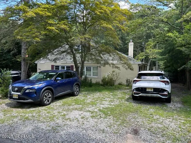 a car parked in front of a house