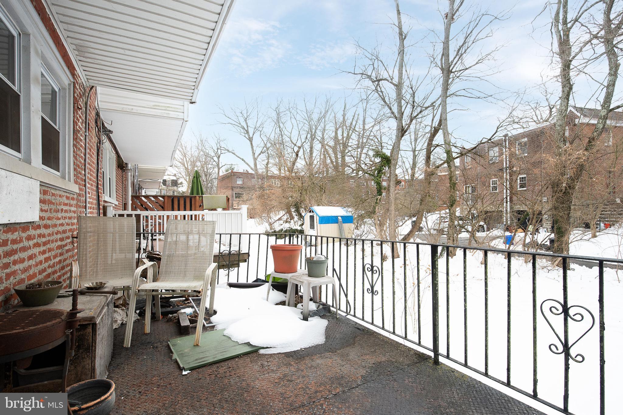 7042 Greene Street Philadelphia, PA 19119 - Photo 16 of 17 rear porch above garage