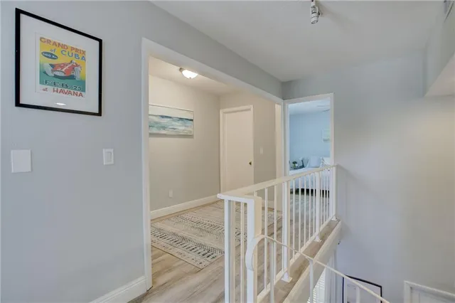 a view of entryway with wooden floor