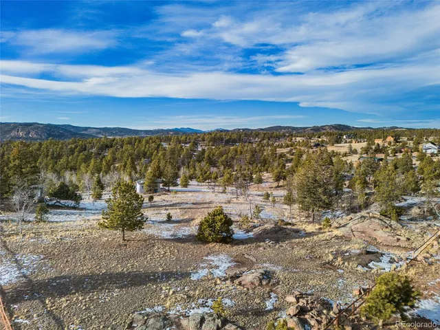 a view of a lake with a city