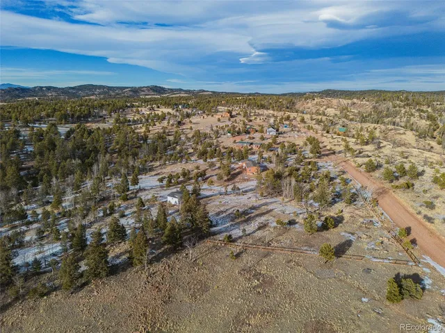 a view of city with ocean