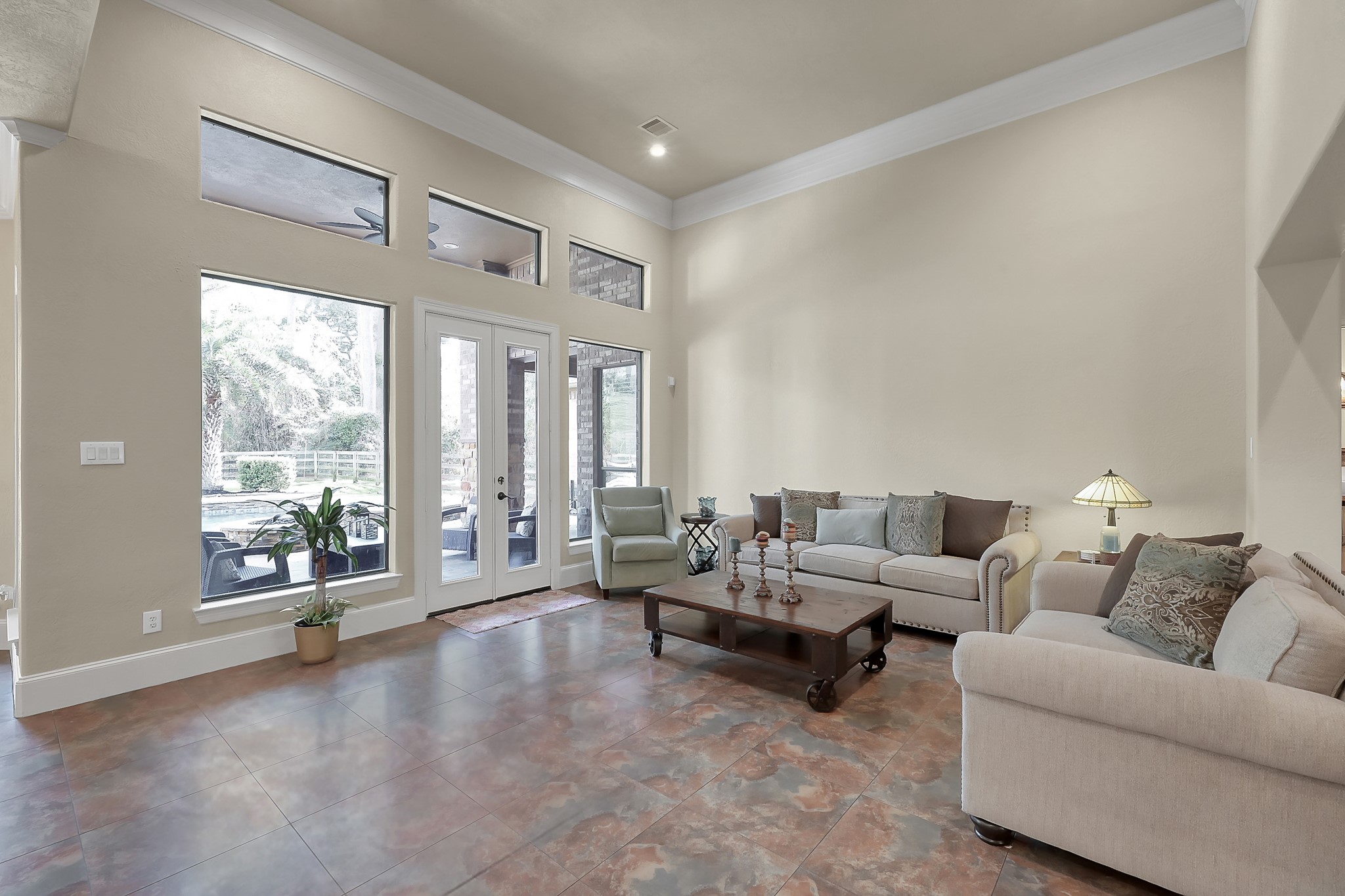 22742 Timberlake Creek Road Tomball, TX 77377 - Photo 13 of 50 a living room with furniture and large windows