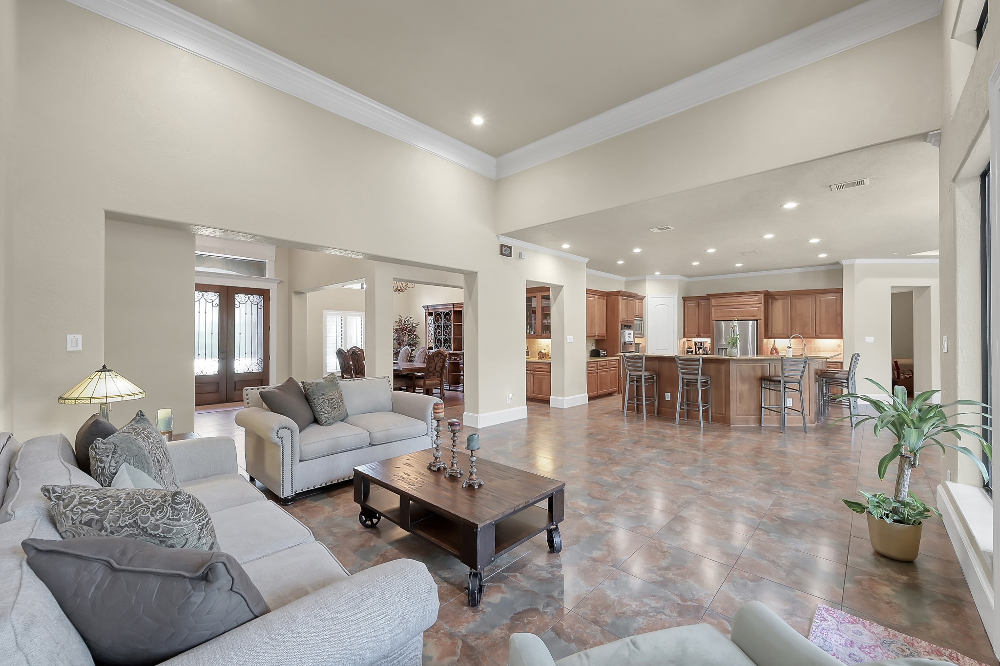 22742 Timberlake Creek Road Tomball, TX 77377 - Photo 15 of 50 a living room with furniture potted plant kitchen view and a window
