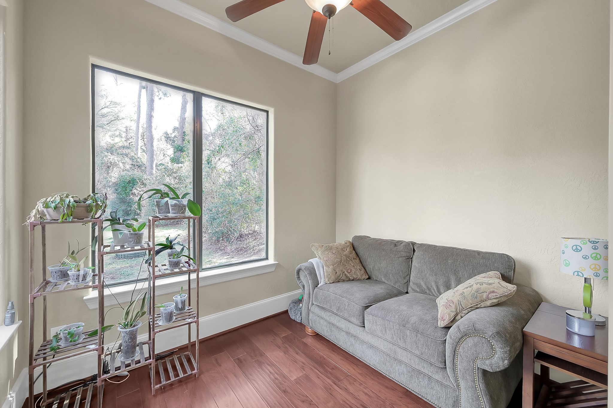 22742 Timberlake Creek Road Tomball, TX 77377 - Photo 28 of 50 a living room with furniture and a large window
