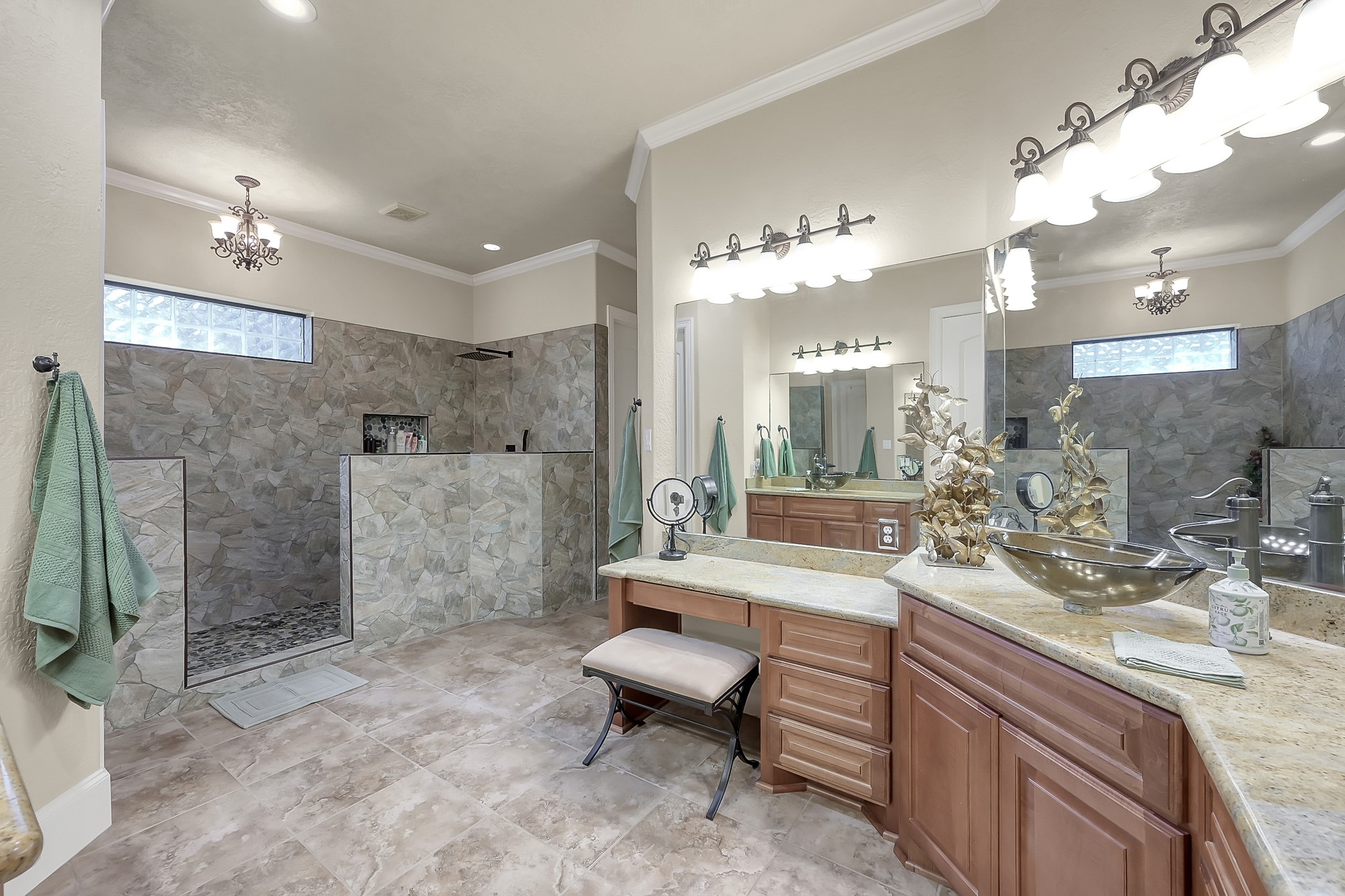 22742 Timberlake Creek Road Tomball, TX 77377 - Photo 29 of 50 a bathroom with a double vanity sink mirror and toilet