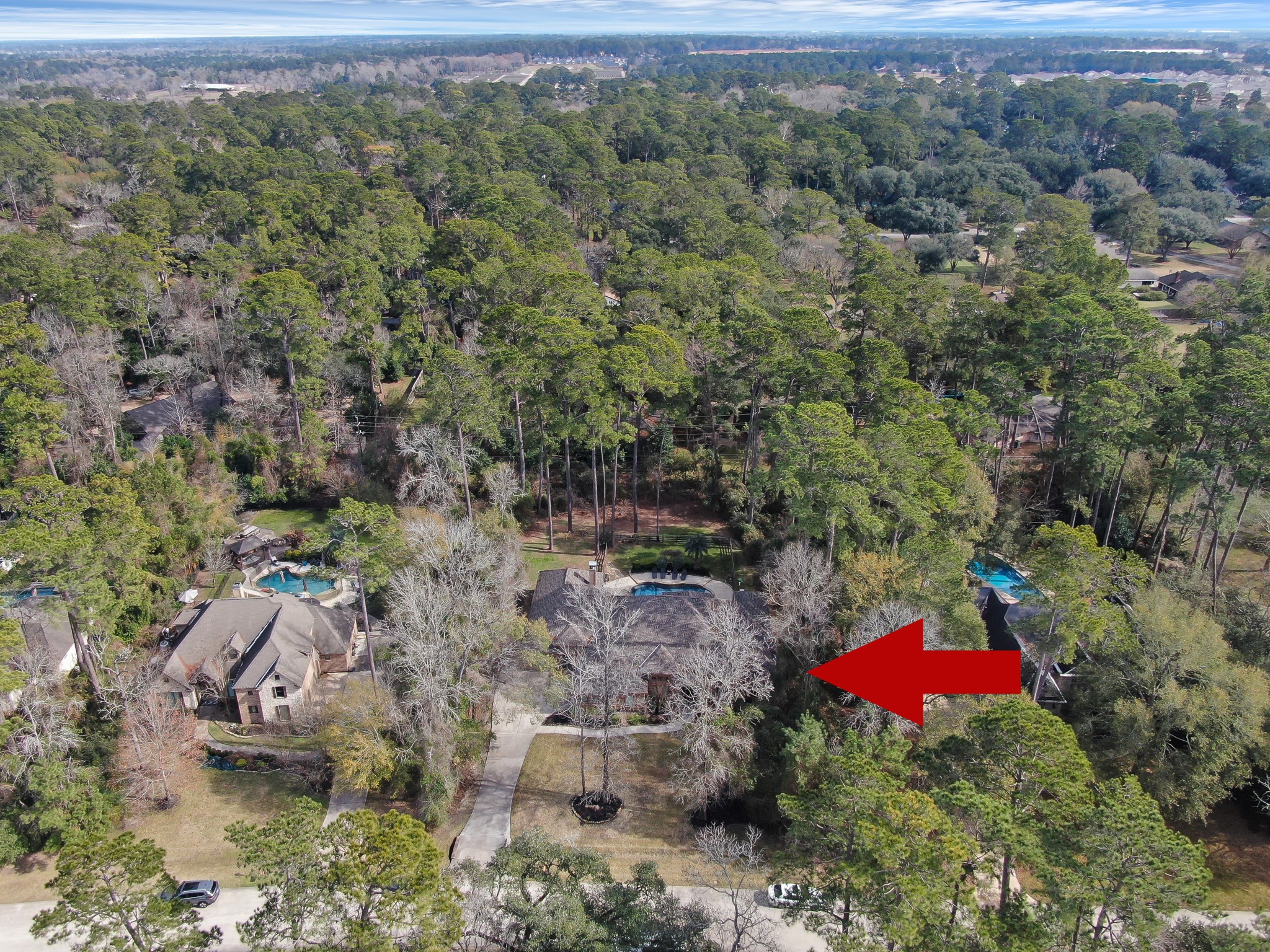 22742 Timberlake Creek Road Tomball, TX 77377 - Photo 49 of 50 an aerial view of residential house with outdoor space and swimming pool