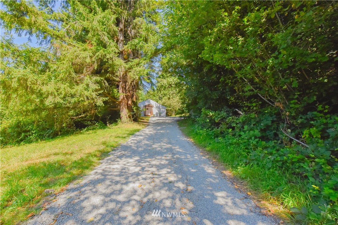 19409 High Rock Road Monroe, WA 98272 - Photo 2 of 40 a pathway of a yard