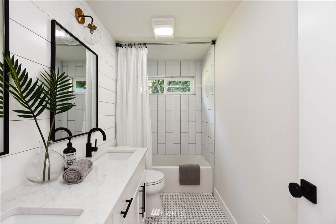 19409 High Rock Road Monroe, WA 98272 - Photo 24 of 40 a bathroom with a sink a toilet and shower