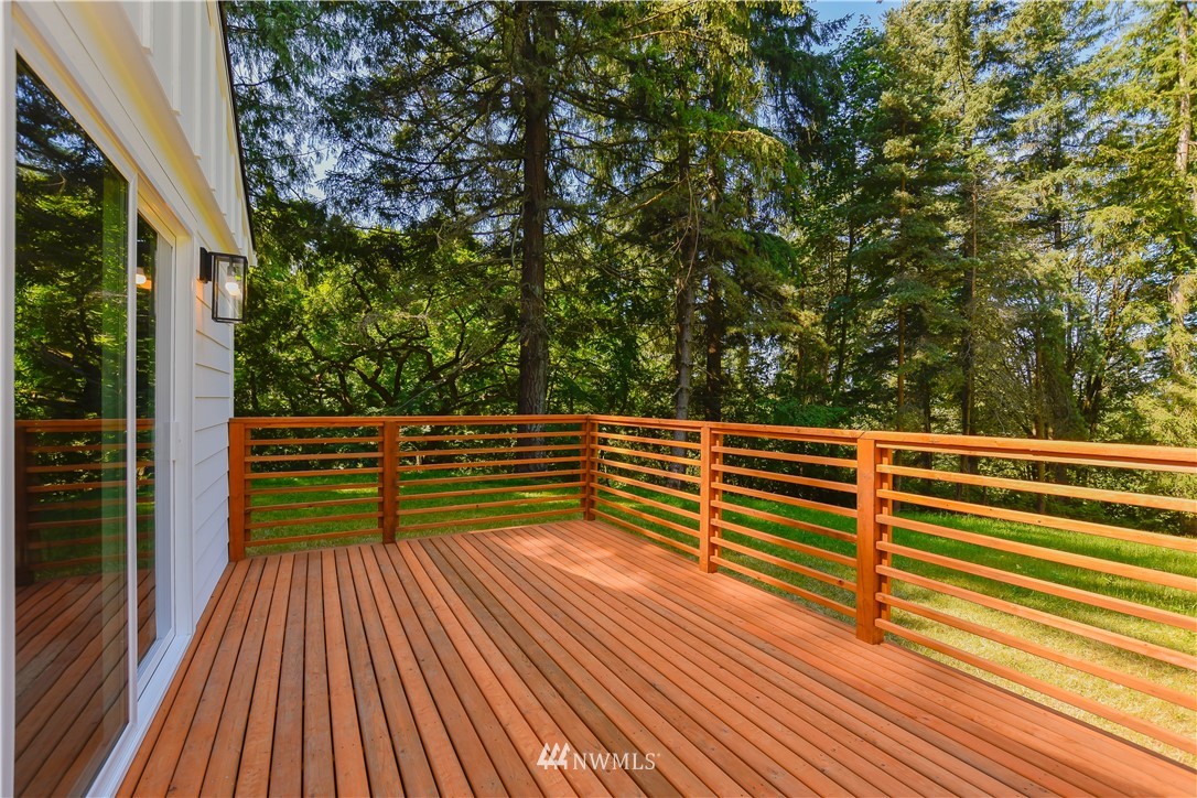 19409 High Rock Road Monroe, WA 98272 - Photo 33 of 40 a view of a balcony with wooden floor and fence