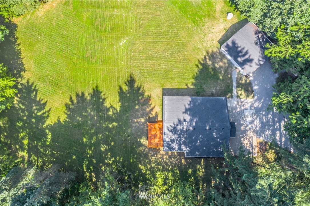 19409 High Rock Road Monroe, WA 98272 - Photo 39 of 40 an aerial view of a house with a yard and garden