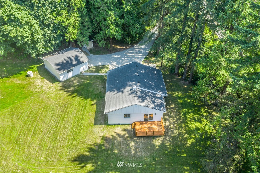 19409 High Rock Road Monroe, WA 98272 - Photo 40 of 40 an aerial view of a house with a yard swimming pool and outdoor seating