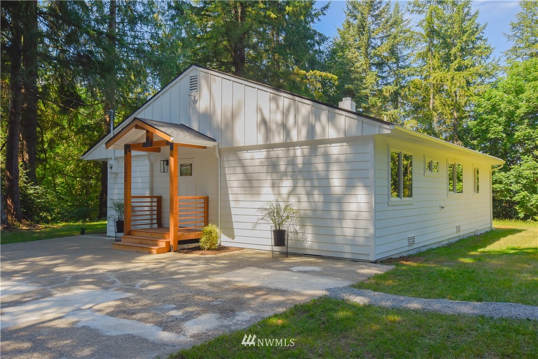 19409 High Rock Road Monroe, WA 98272 - Photo 5 of 40 a backyard of a house with barbeque oven and table