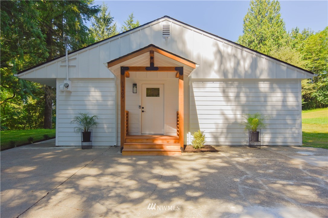19409 High Rock Road Monroe, WA 98272 - Photo 6 of 40 a front view of a house with a yard
