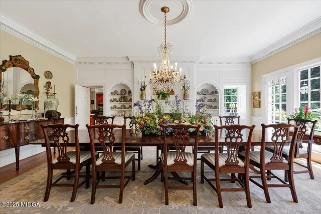 a view of a dining room with furniture window and outside view