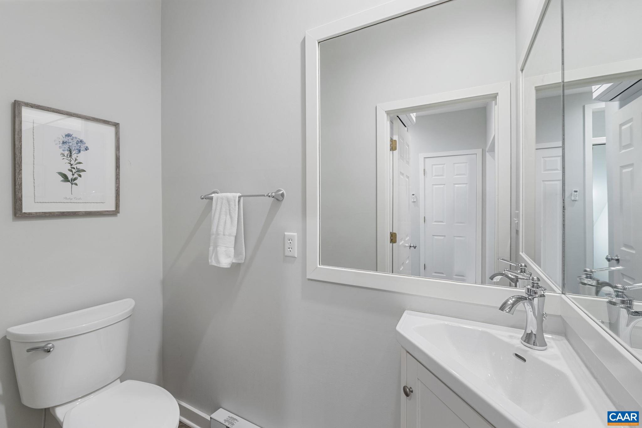 23 Trillium Cl Roseland, VA 22967 - Photo 15 of 48 a bathroom with a toilet sink and mirror