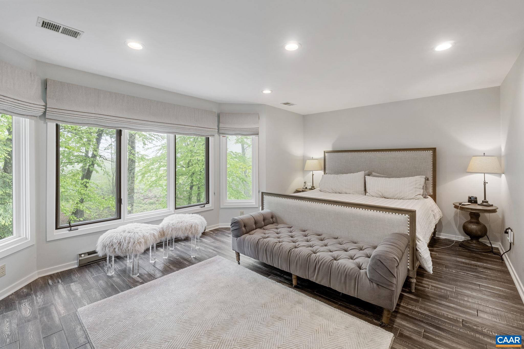 23 Trillium Cl Roseland, VA 22967 - Photo 17 of 48 a bedroom with a bed and a large window