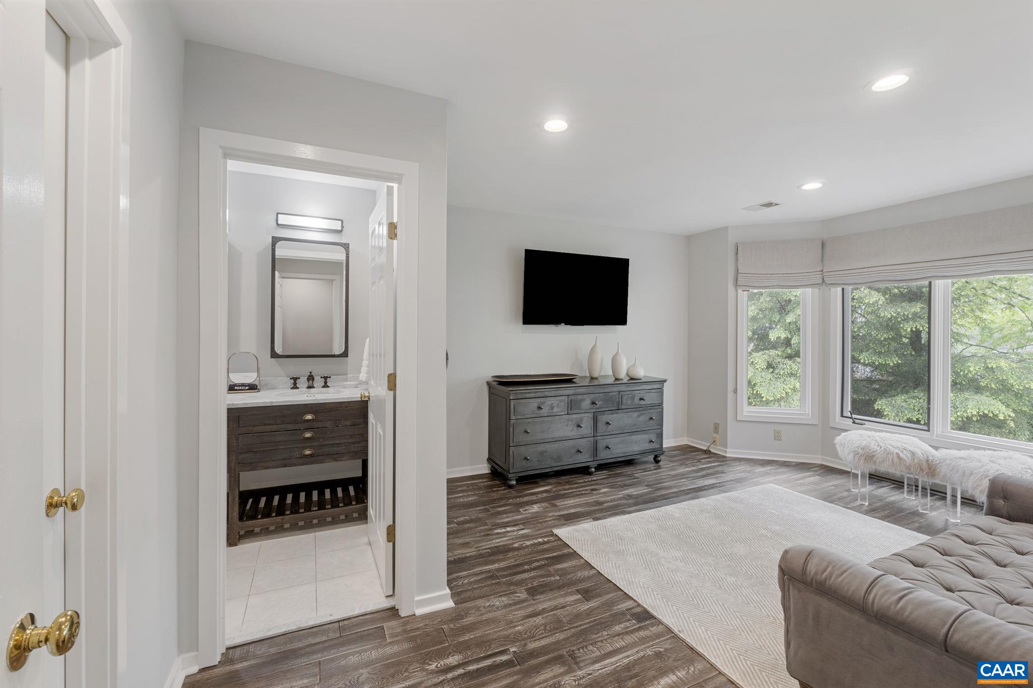 23 Trillium Cl Roseland, VA 22967 - Photo 19 of 48 a living room with furniture and a flat screen tv