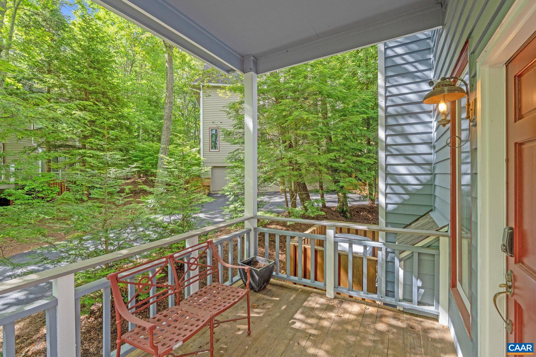 23 Trillium Cl Roseland, VA 22967 - Photo 37 of 48 a view of a porch with a floor to ceiling window and an outdoor view