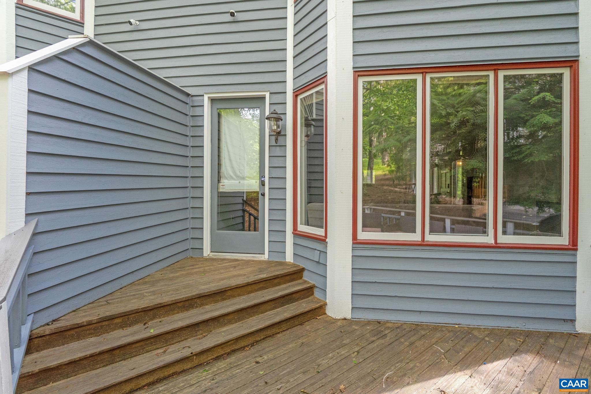 23 Trillium Cl Roseland, VA 22967 - Photo 40 of 48 a view of a house with a balcony and a large window