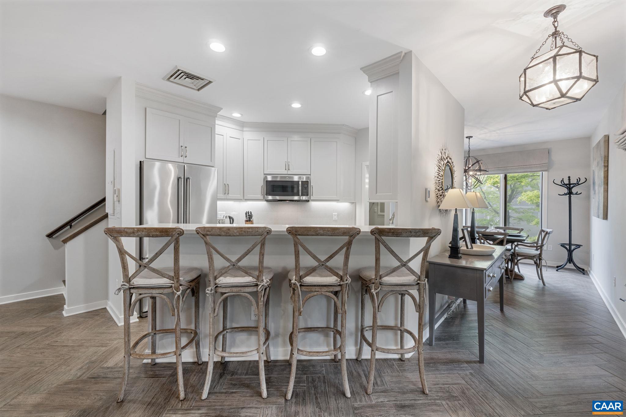 23 Trillium Cl Roseland, VA 22967 - Photo 5 of 48 a view of a dining room with furniture window and wooden floor